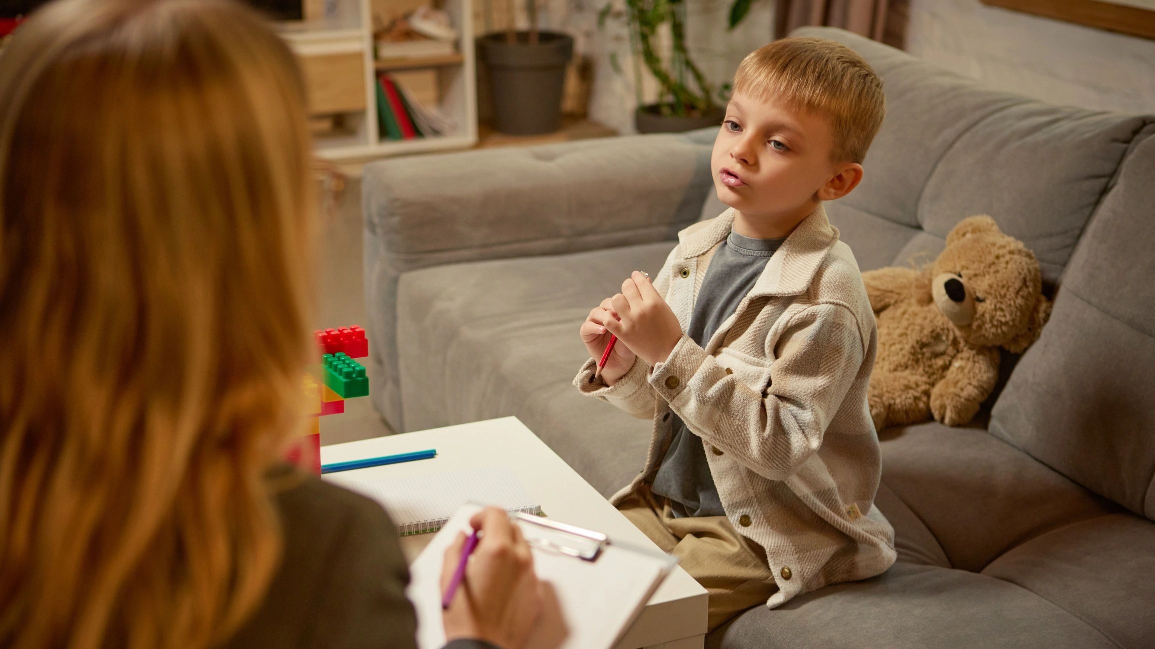 Child therapy session in a warm, inviting environment